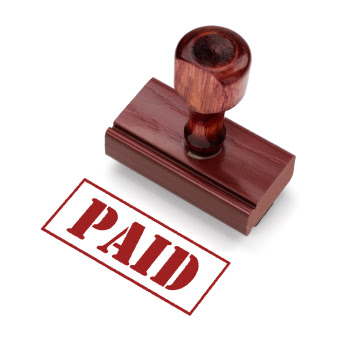 Rubber Stamp indicating payment. Includes clipping path for stamp.